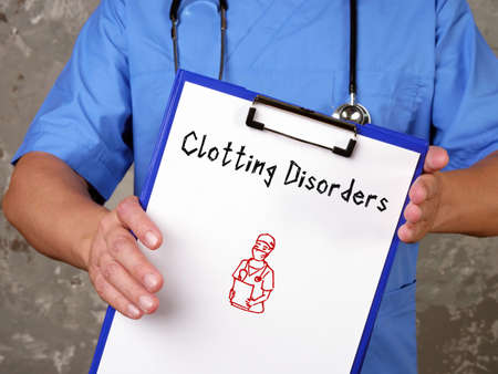 Medical concept meaning Clotting Disorders  with inscription on the sheet.