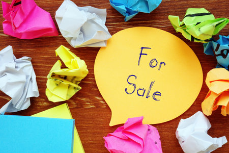 Financial concept about For Sale with sign on the page.の写真素材