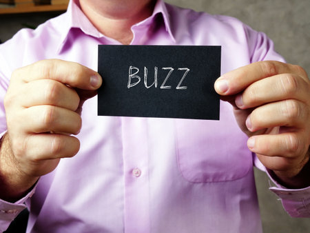 Business concept meaning BUZZ  with inscription on the piece of paper.の写真素材