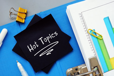Financial concept about Hot Topics  with inscription on the piece of paper.の写真素材