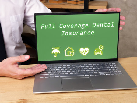 Business concept meaning Full Coverage Dental Insurance with phrase on the piece of paper.の写真素材