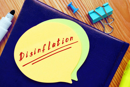 Business concept about Disinflation with phrase on the sheet.の写真素材