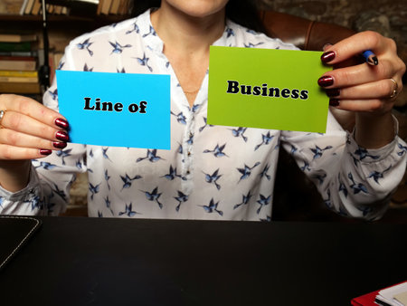 Business concept about Line of Business with phrase on blank business cards.の写真素材