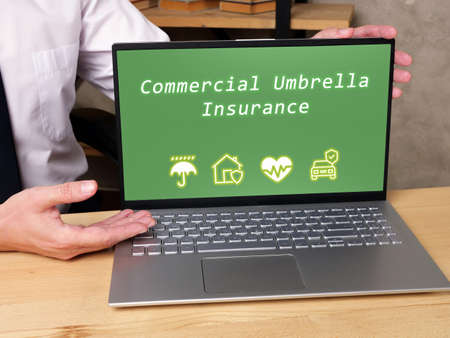 Business concept meaning Commercial Umbrella Insurance with phrase on the page.の写真素材