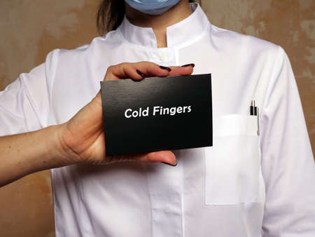 Medical concept about Cold Fingers with phrase on the piece of paper.の写真素材