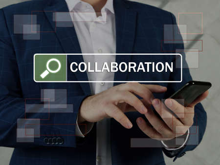 COLLABORATION inscription on the screen. Close up Broker hands holding black smart phone....