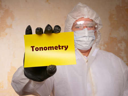 Healthcare concept about Tonometry with phrase on the piece of paper.