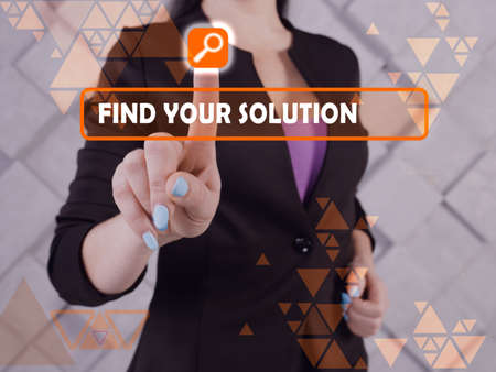 FIND YOUR SOLUTION inscription on the screen. Modern Banker hands holding black smart phone.の写真素材