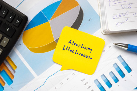 Business concept meaning Advertising Effectiveness with sign on the piece of paper.