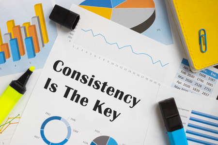 Business concept about Consistency Is The Key with inscription on the sheet.の写真素材