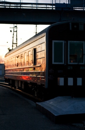 The train carriage in beams of a solar decline