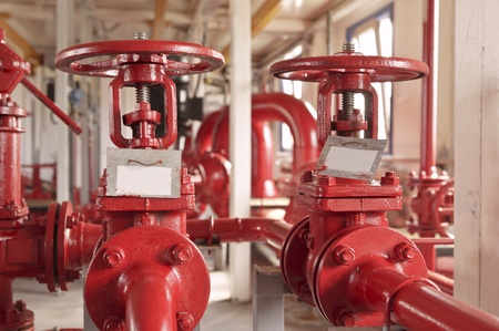 Two red valve at plant on oil refining and gasの写真素材