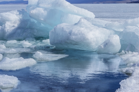 Big blocks of the broken ice and thawed snow