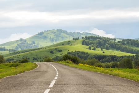 Beautiful summer landscape of the road among mountainsの写真素材
