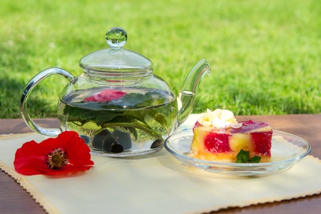 Tasty breakfast on white cloth in gardenの写真素材