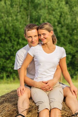 Two lovers have rest outdoors in sunny dayの写真素材