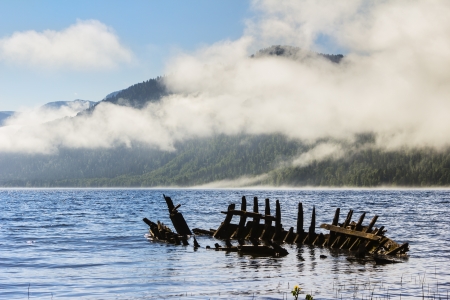 The old broken ship to the lake Teletsky among Mountains Altai.の写真素材