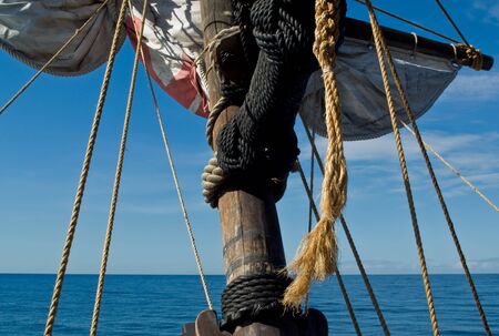 Sailing along Madeira coast on a replica of old sailing vessel.の写真素材