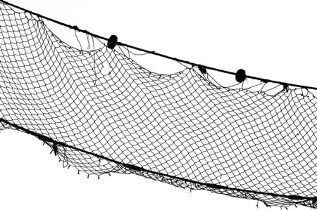 Old fishing Net, black on white, Limenaria on Thasos Island, Greece.の写真素材
