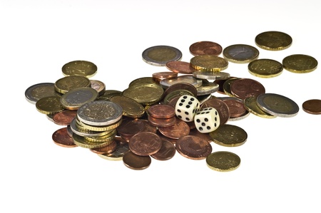 Two white dice and Euro coins on whiteの写真素材