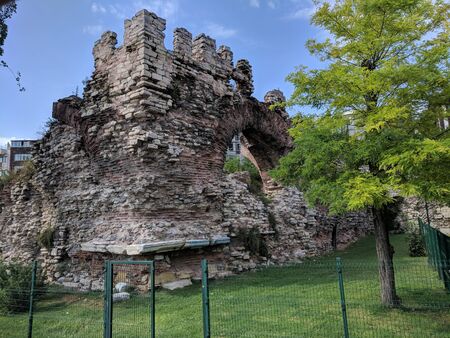 Damaged grey stonewall ruins found in Istanbul.のeditorial素材