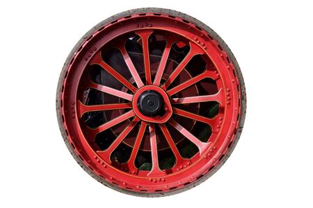 Isolated steam traction engine wheel, red with thin rubber tyreの写真素材
