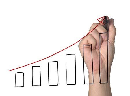 hand drawing a graph on white backgroundの写真素材