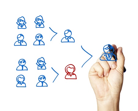 Business man illustrating a team leaders key role.の写真素材