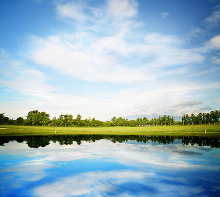 green field and blue skyの写真素材