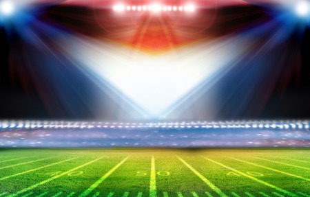 Green soccer field, bright spotlightsの写真素材