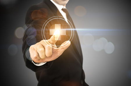 hand touch on First Aid sign.の写真素材