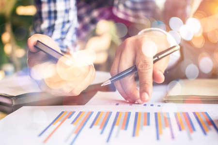 Team work process. young business managers crew working with new startup project. labtop on wood table,の写真素材