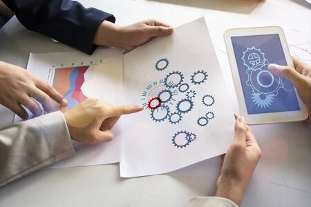 Businessman holding in hand tablet with global connection conceptの写真素材