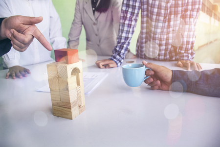 Planning, risk and strategy in business, business gambling placing wooden block