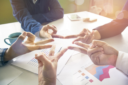 Five people engaged in hand with an asteriskの写真素材
