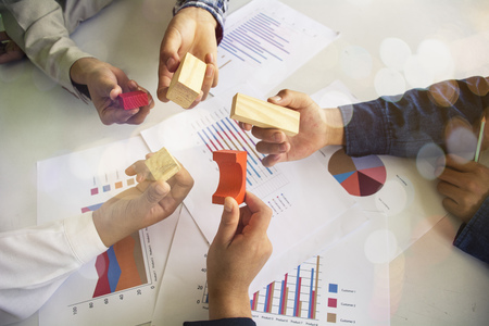 Business team working on laptop, while sitting at office. Business people.の写真素材