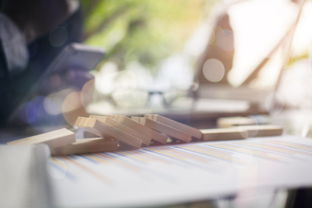 Business men is using the phone on the desk.の写真素材