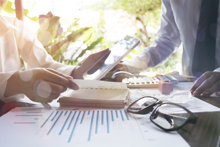 Close-up shot of an analytical team working with the latest financial results, Office life concept.