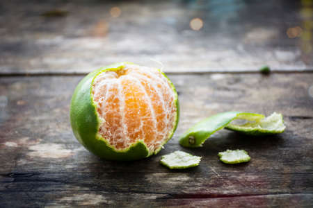 Fresh Orange on Wood Table Desk Background, Rustic Style.の写真素材