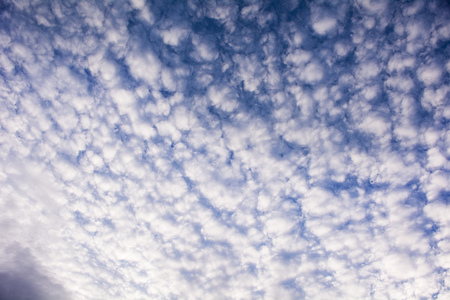 blue sky background with tiny cloudsの写真素材