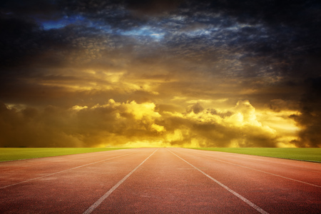 White lines and texture of running racetrackの写真素材