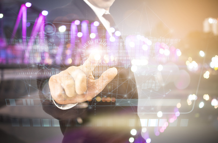 Business person working with graph modern virtual technologyの写真素材