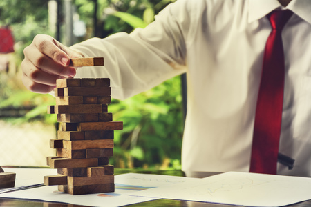 Businessman Building Up Tower  Challenge In Business Conceptの写真素材