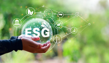 Hands holding the green ball that writes the word ESG with ESG icon concept. ESG concept,の写真素材