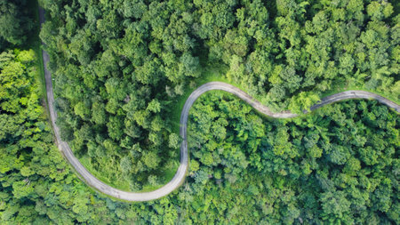 Winding road, top view of beautiful aerial view of asphalt road,の写真素材