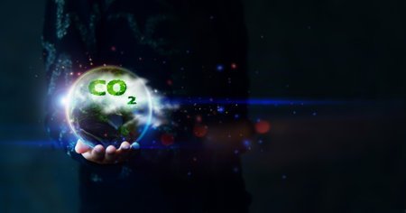 Reduce CO2 emission concept, Earth in the hand for environmental, global warming, Sustainable development and green business based on renewable energy.の写真素材