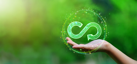 Businesswoman hold circular economy icon. The concept of eternity, endless and unlimited, circular economy for future growth of business and environment sustainableの写真素材
