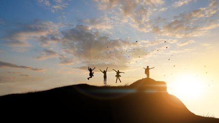 Happy cheering celebrating success woman at beautiful sunset above the clouds. Girl enjoying view of colorful sunset with arms raised up towards the sky.の写真素材