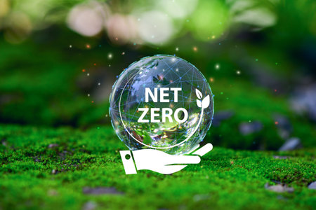 Hand holding green leaf with Net-Zero icons. CO2 Net-Zero Emission - Carbon Neutralityの写真素材