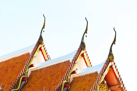painting craved front and top roof of budda temple building 